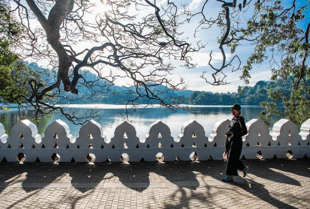 Golden Reflections – Evening Walk by Kandy Lake